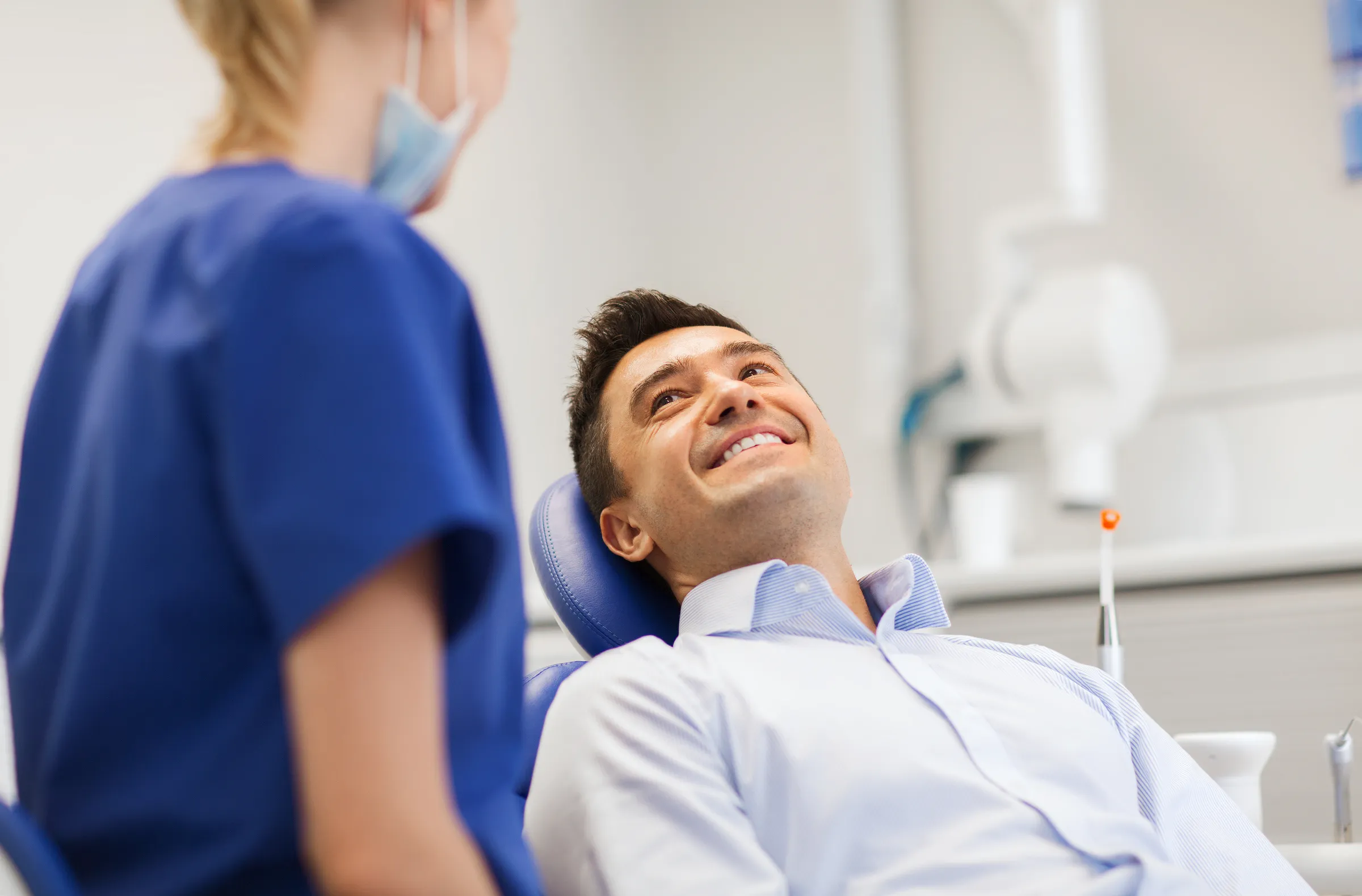 A new patient examination underway in the chair at Valencia Dental Office.