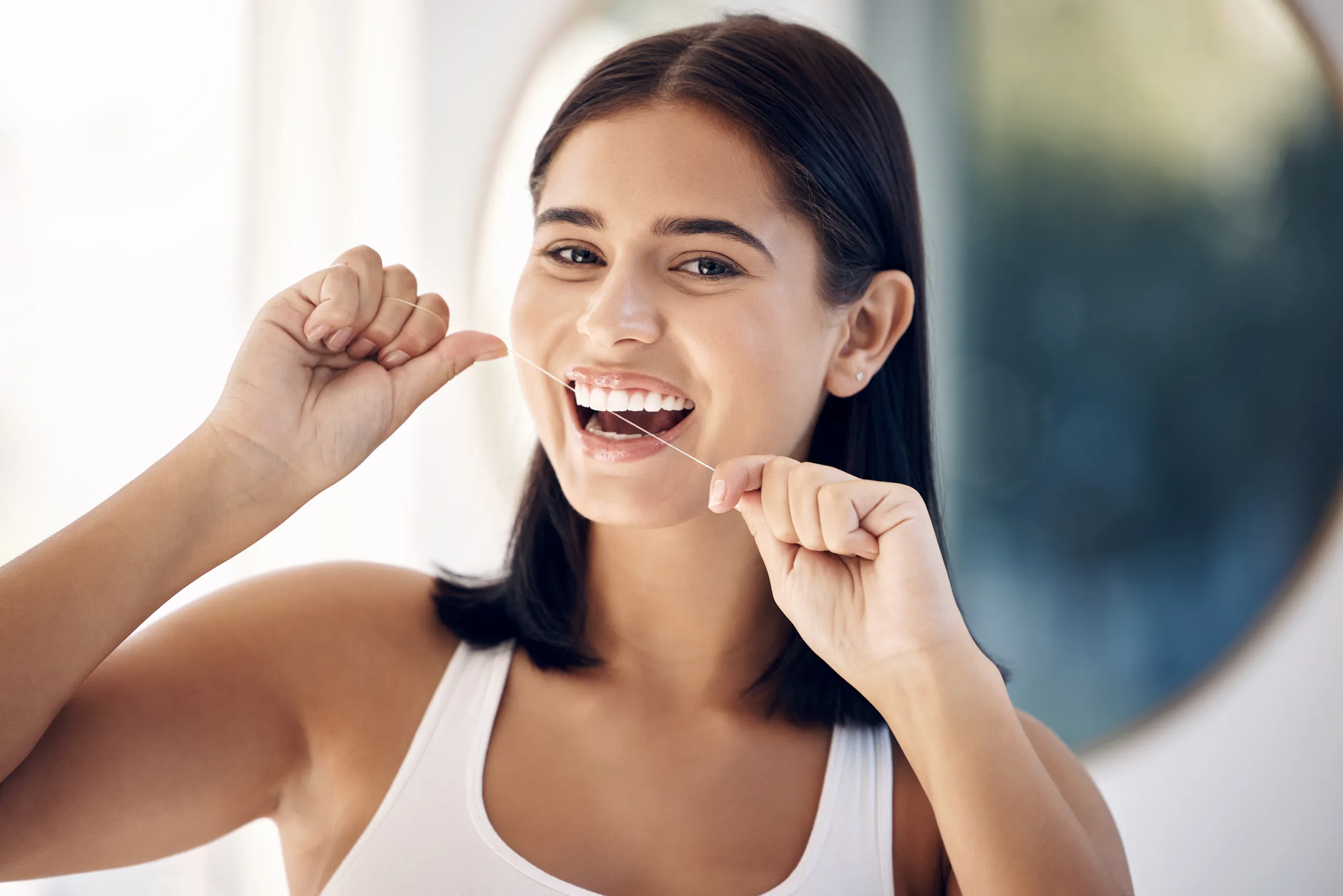 Patient practicing thorough at-home oral hygiene