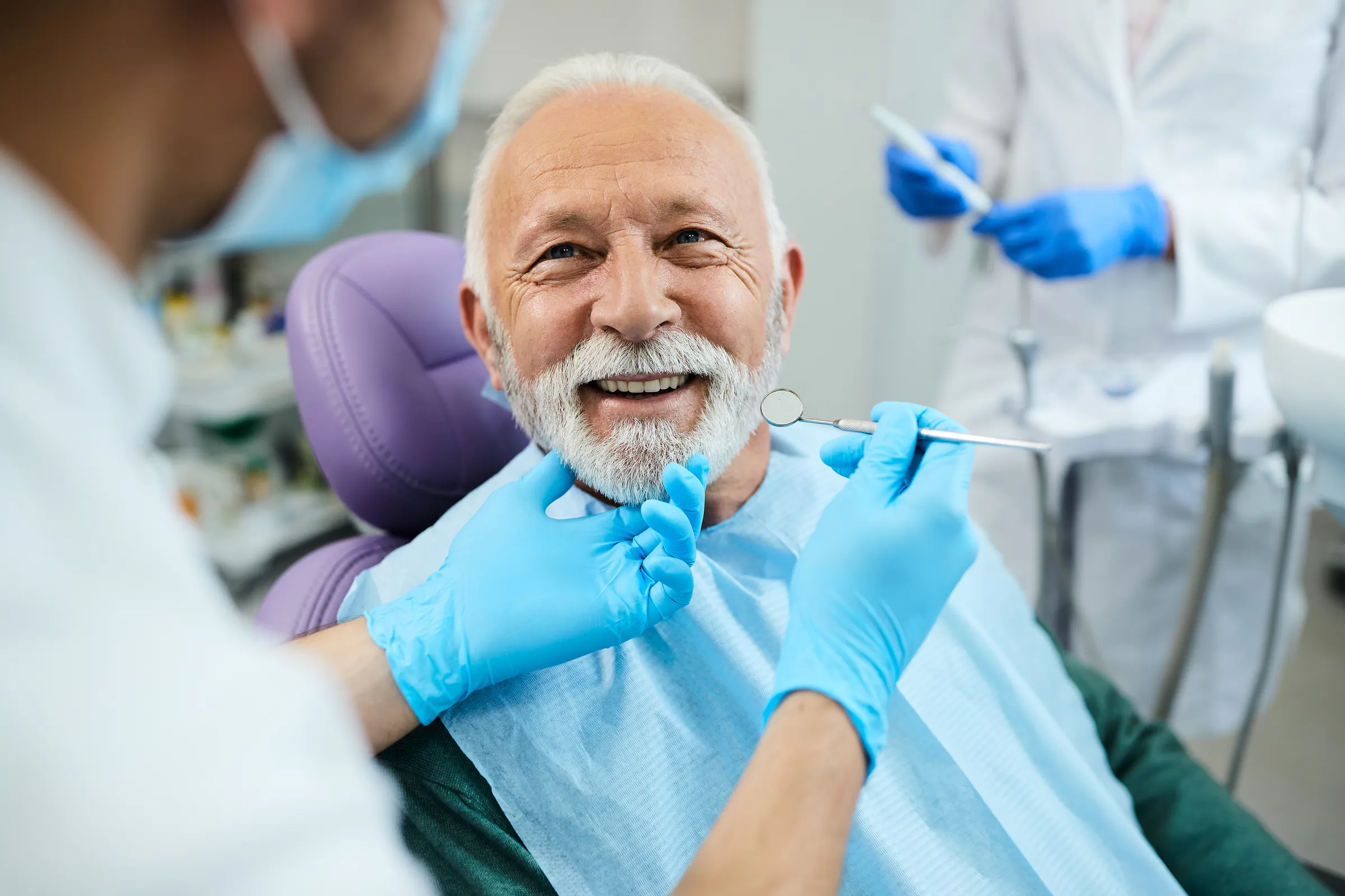 Patient adjusting to wearing a new denture