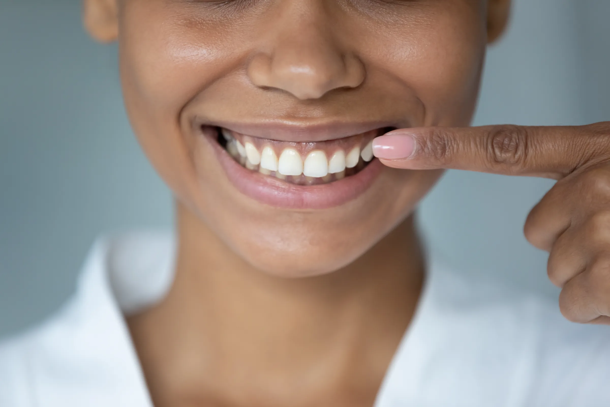 Dentist examining a patient's frenum