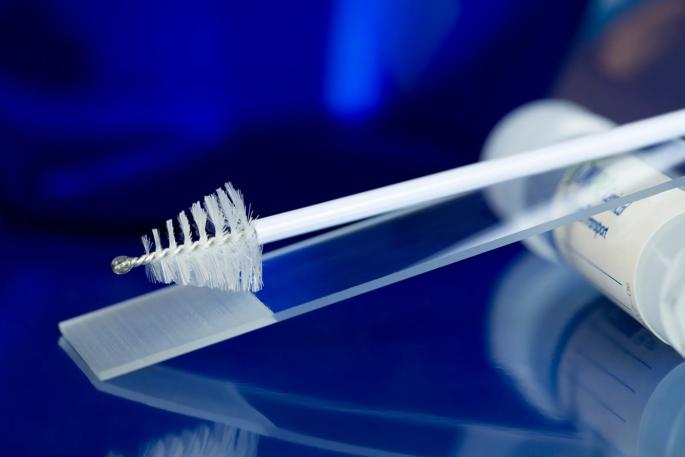 Dentist examining a patient's mouth and throat area