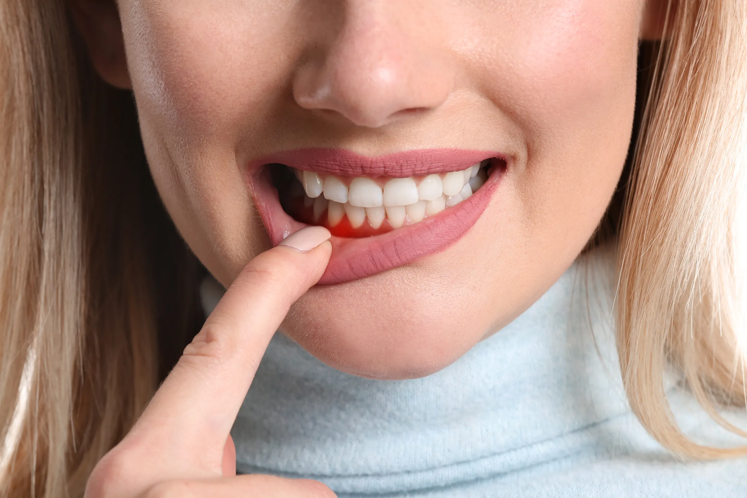 Dentist examining a patient's gum health